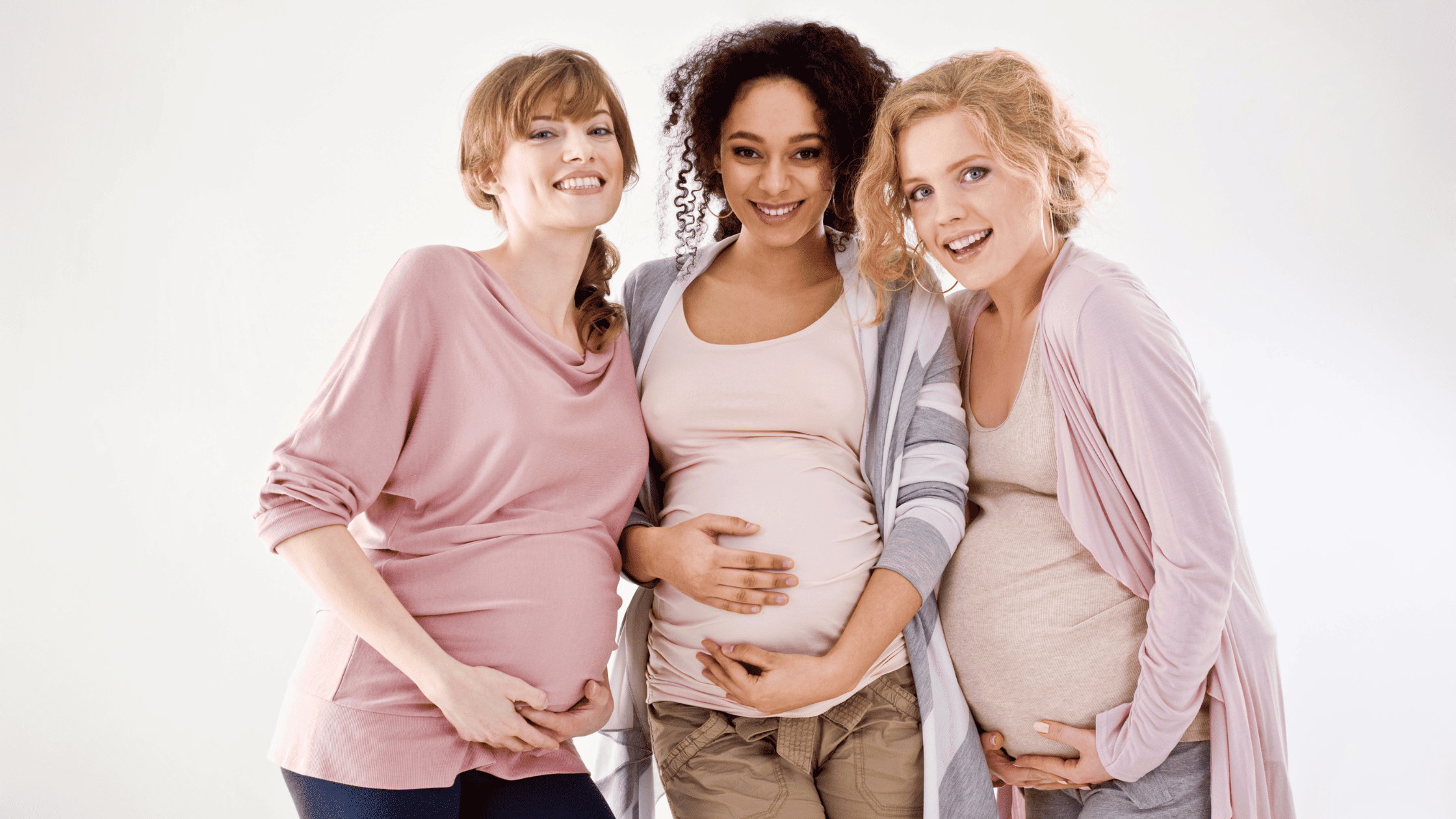 three pregnant women, excited about birth